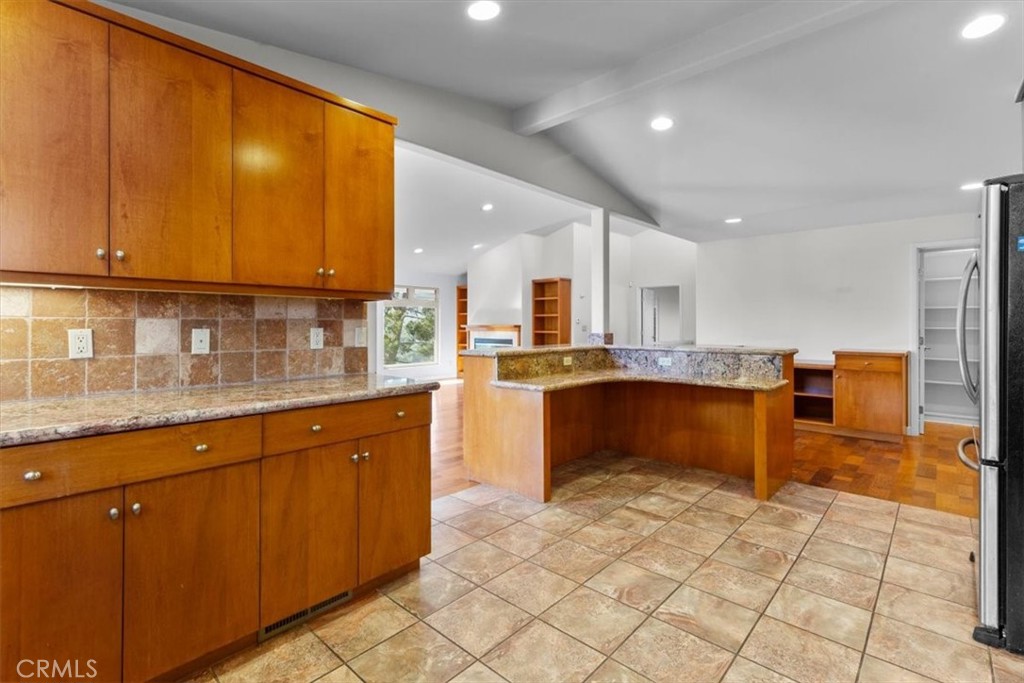 2377 Silver Ridge Avenue Los Angeles, CA 90039 - Photo 20 of 46 a kitchen with stainless steel appliances granite countertop a refrigerator sink and cabinets