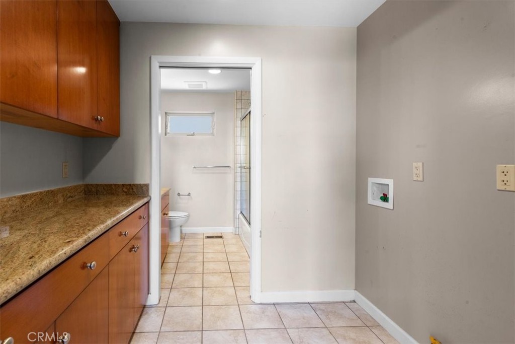 2377 Silver Ridge Avenue Los Angeles, CA 90039 - Photo 24 of 46 a kitchen with a sink and a stove