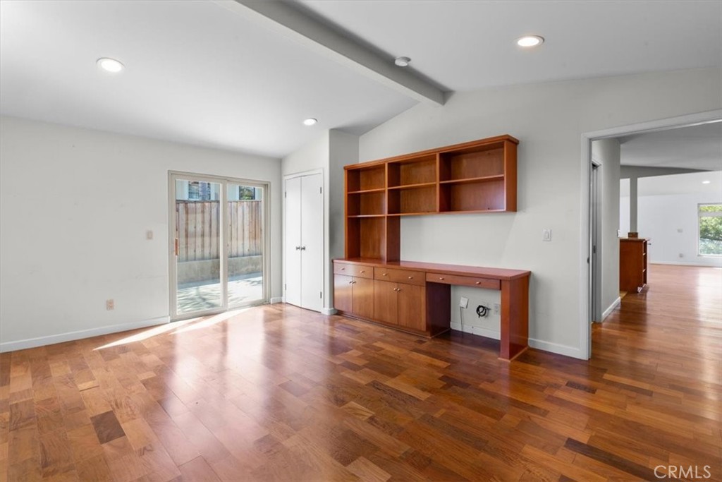 2377 Silver Ridge Avenue Los Angeles, CA 90039 - Photo 27 of 46 a view of an empty room with wooden floor and a window