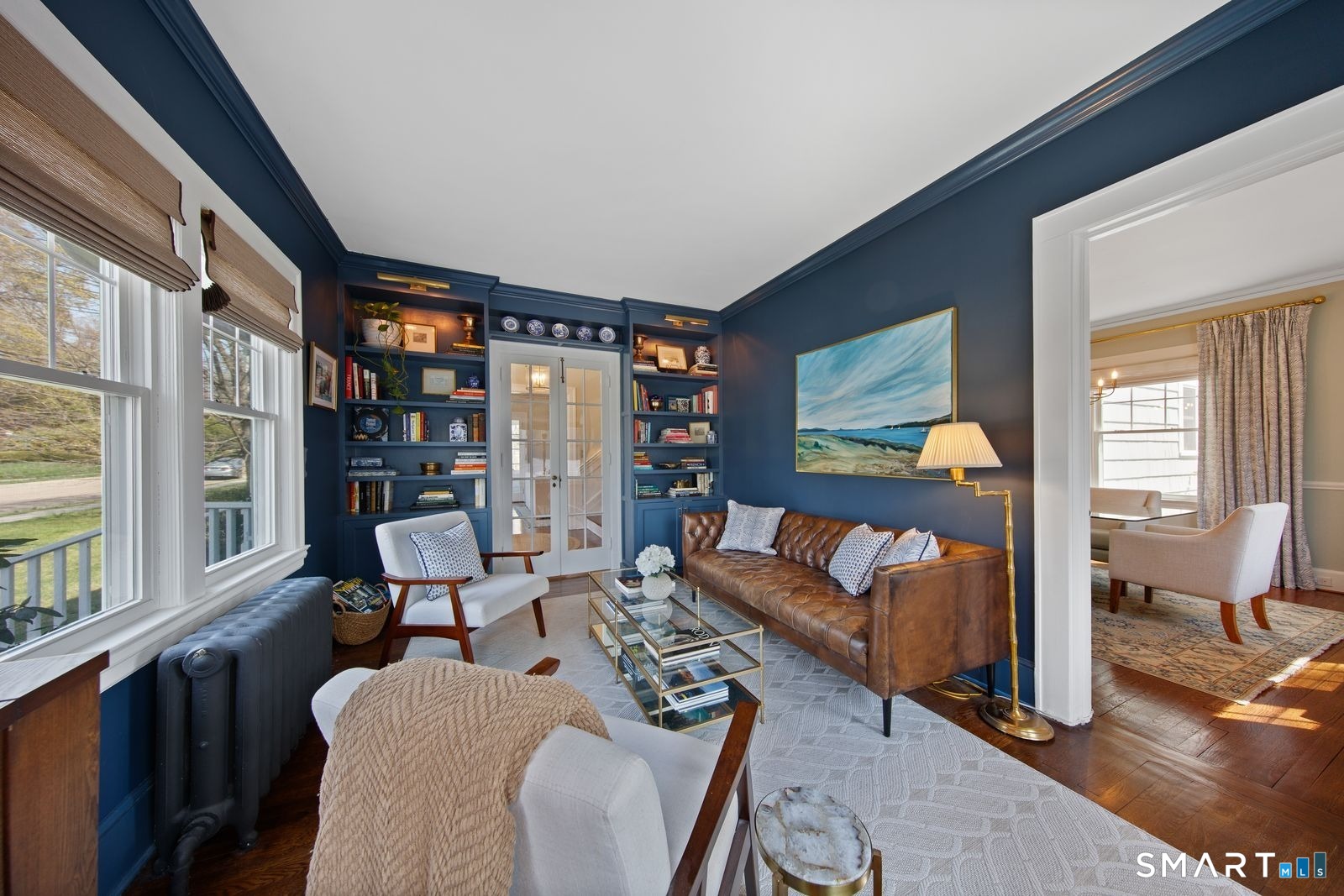 41 Chester Street Stamford, CT 06905 - Photo 11 of 40 a living room with furniture and a book shelf