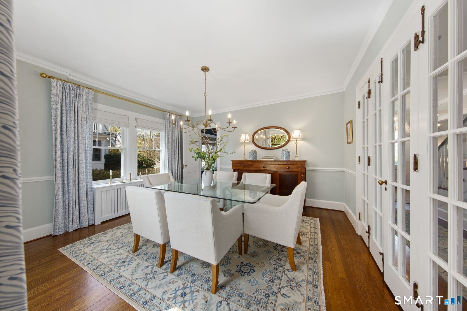 41 Chester Street Stamford, CT 06905 - Photo 13 of 40 a view of a dining room with furniture window and wooden floor