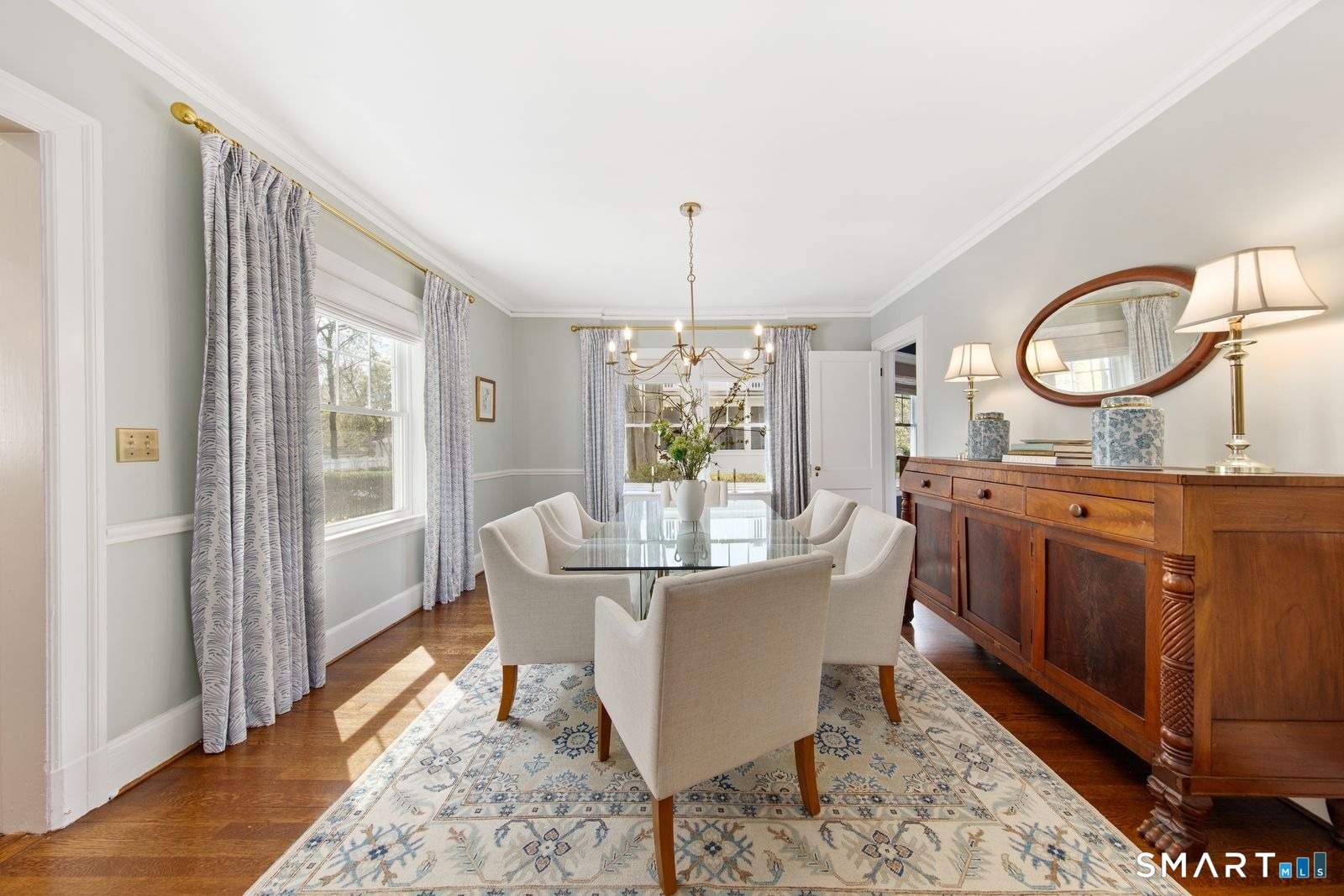 41 Chester Street Stamford, CT 06905 - Photo 14 of 40 a living room with furniture a window and a dining table