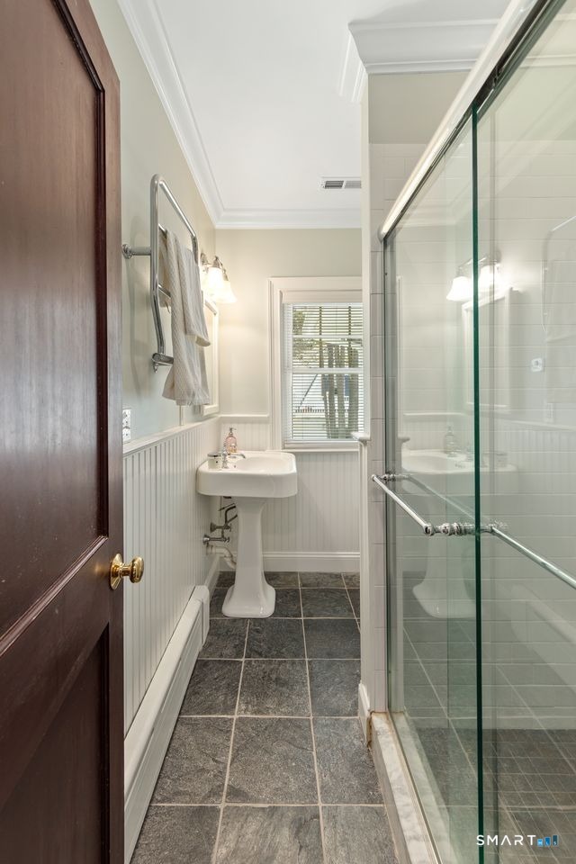 41 Chester Street Stamford, CT 06905 - Photo 28 of 40 a bathroom with a sink toilet and shower
