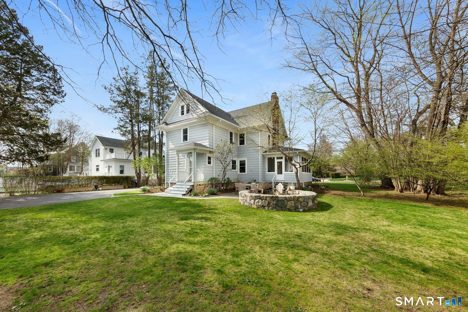41 Chester Street Stamford, CT 06905 - Photo 31 of 40 a view of a house with a big yard and sitting area