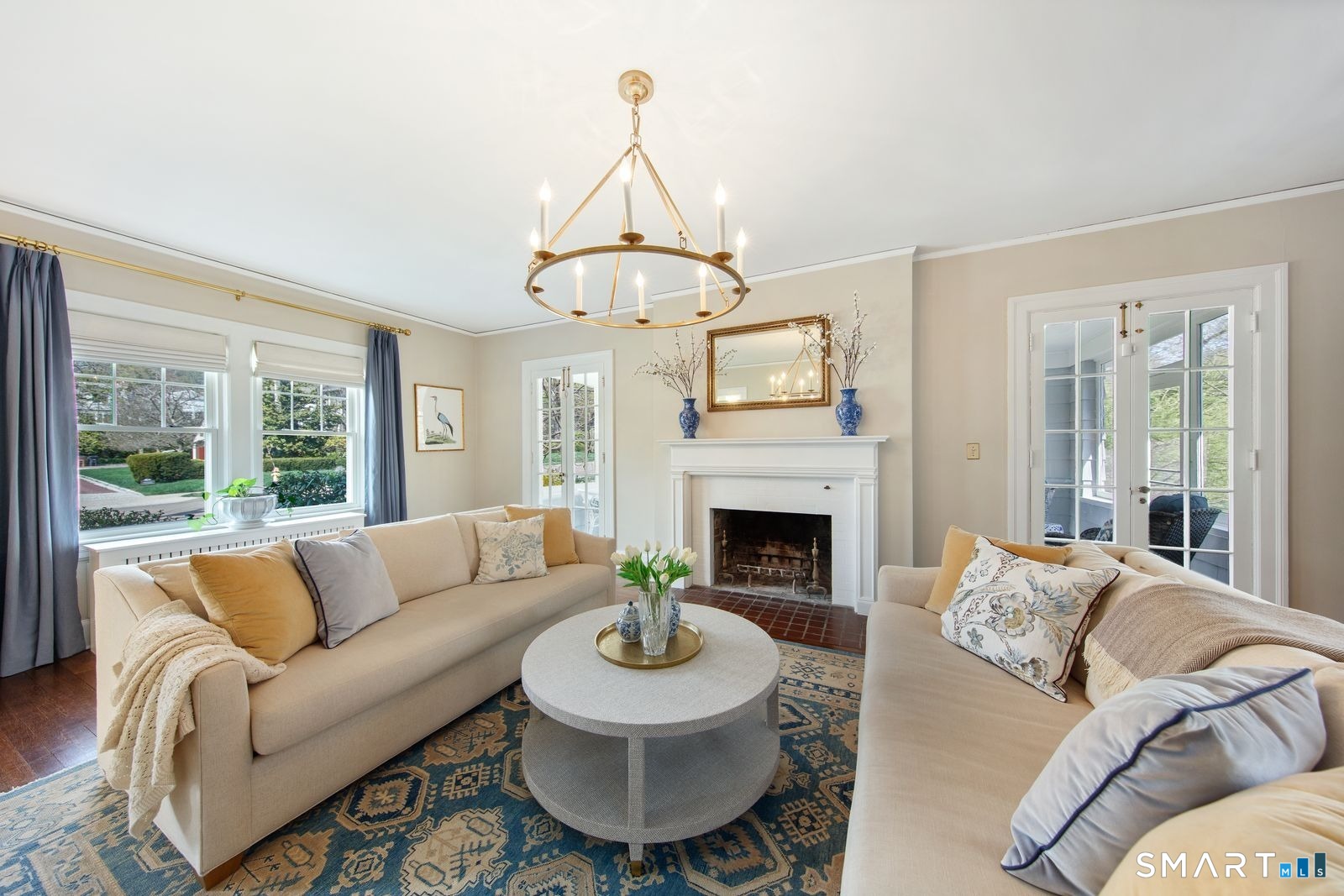 41 Chester Street Stamford, CT 06905 - Photo 7 of 40 a living room with furniture a fireplace and a large window