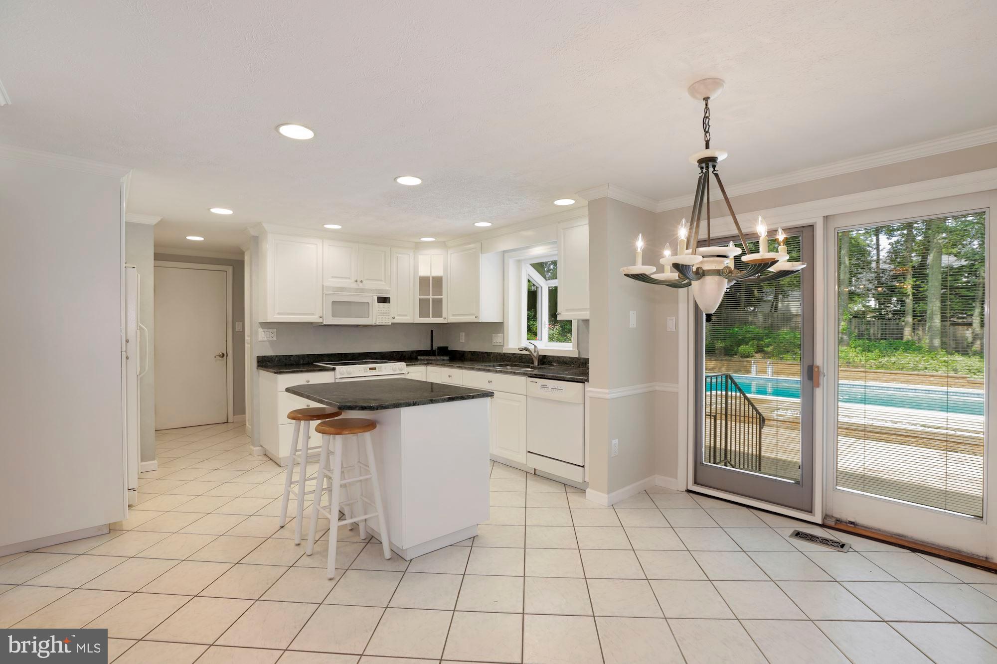 385 Yorkshire Lane Riva, MD 21140 - Photo 4 of 36 Kitchen/Informal Dining overlook pool.
