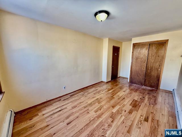 46 Frances Street, Unit 2 Clifton, NJ 07014 - Photo 6 of 8 a view of empty room with wooden floor