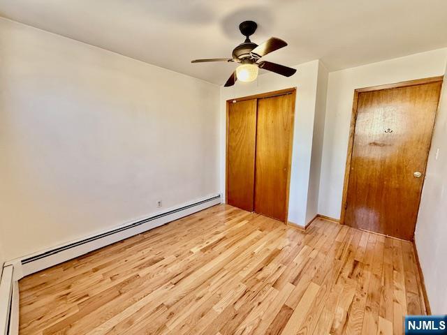46 Frances Street, Unit 2 Clifton, NJ 07014 - Photo 7 of 8 a view of empty room with wooden floor