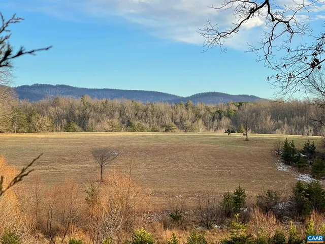 a view of lake with mountain
