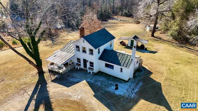 a view of roof deck with large trees