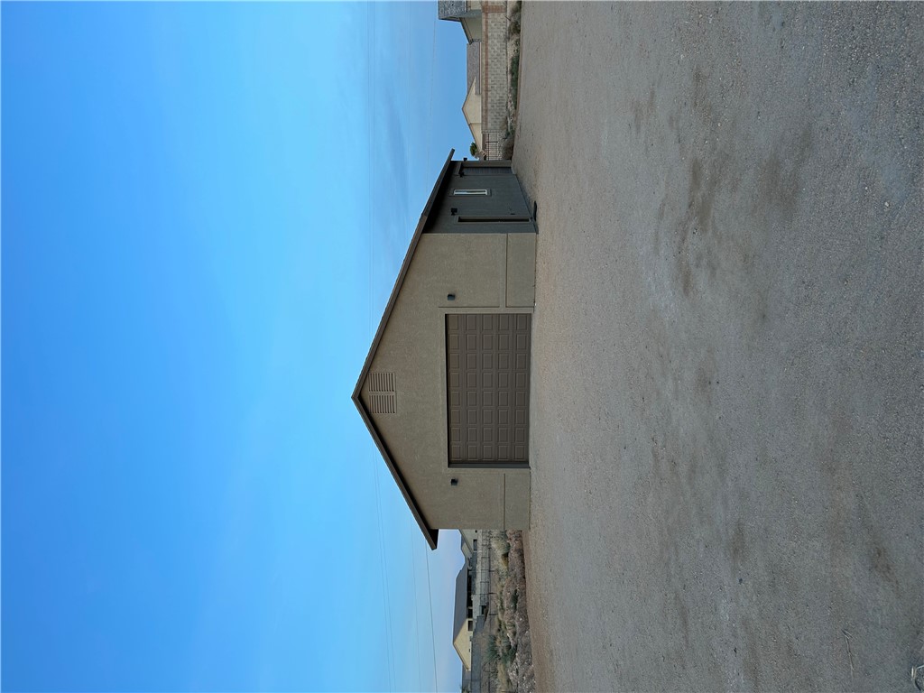 2191 Seneca Street Kingman, AZ 86401 - Photo 13 of 26 a house with a field