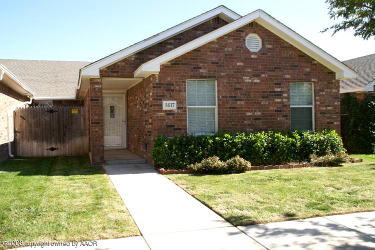 3617 South Mirror Street Amarillo, TX 79118 - Photo 1 of 15 a front view of a house with a yard