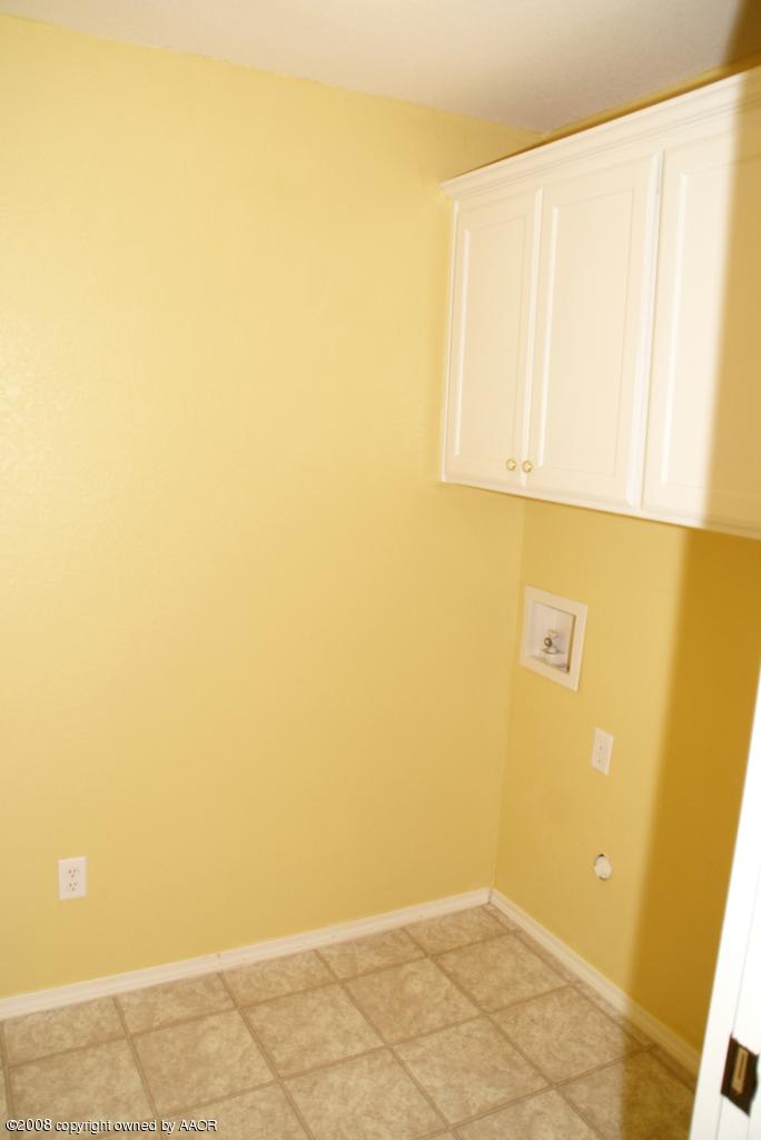 3617 South Mirror Street Amarillo, TX 79118 - Photo 12 of 15 a view of white wall painting on a wall