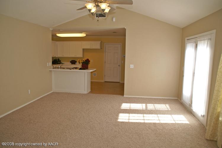 3617 South Mirror Street Amarillo, TX 79118 - Photo 2 of 15 a view of livingroom with chandelier