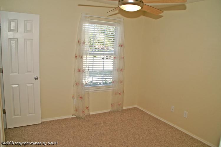 3617 South Mirror Street Amarillo, TX 79118 - Photo 9 of 15 an empty room with windows
