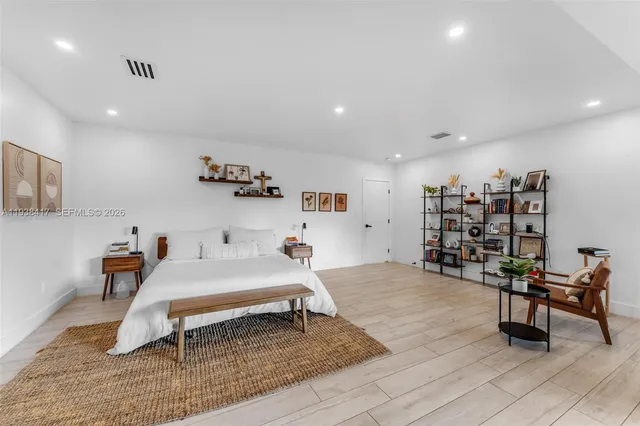 a kitchen with a sink and refrigerator
