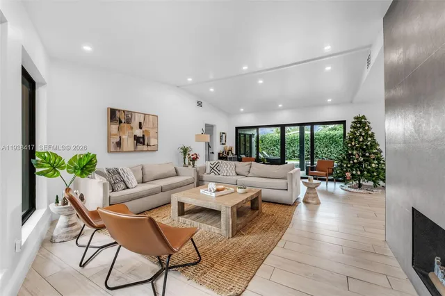 a view of a livingroom with furniture and a couch