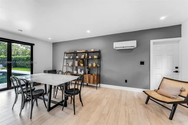 a view of entryway and workspace