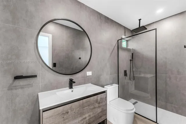 a view of a swimming pool with sitting area