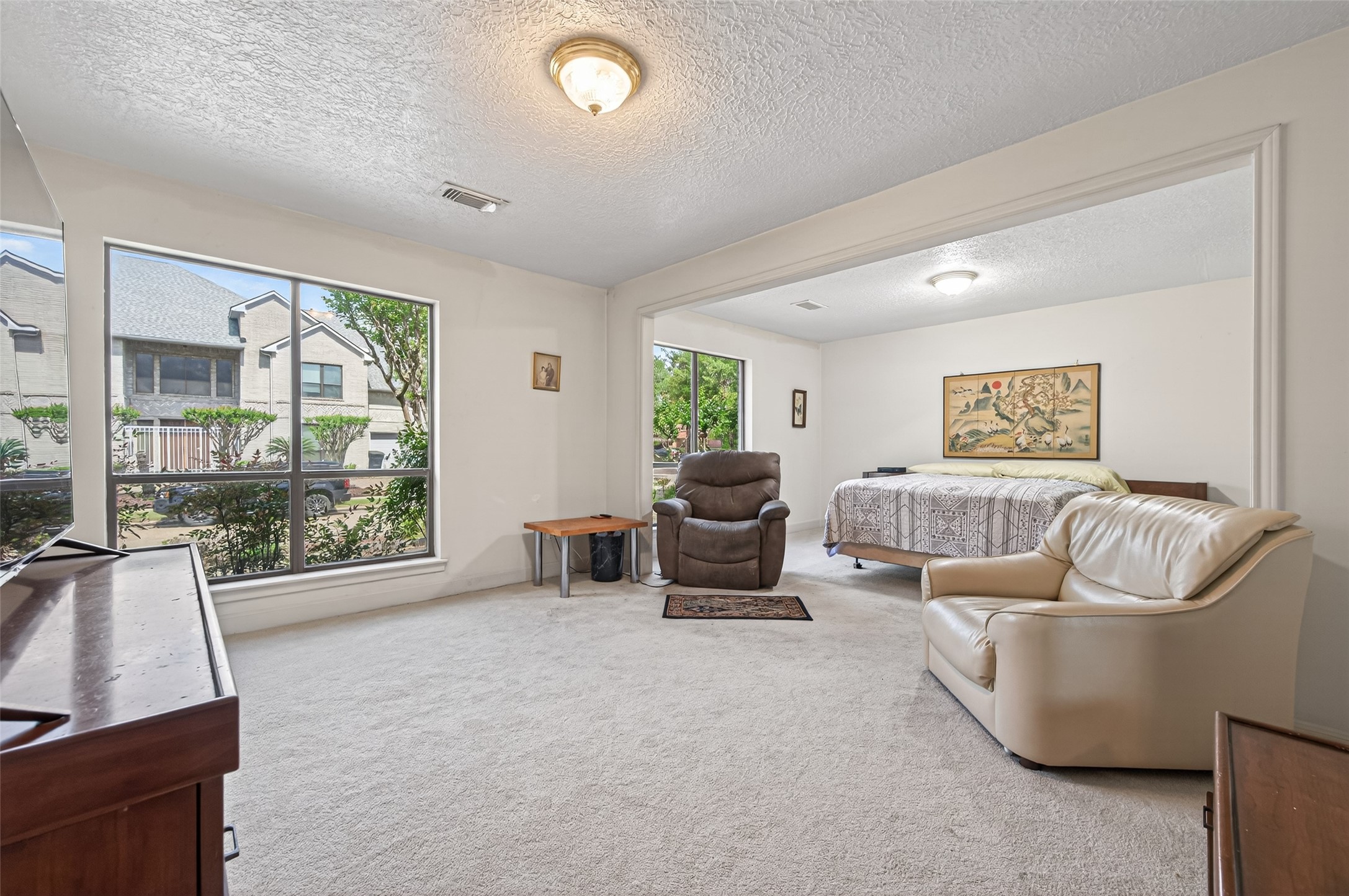 8103 Lake Edge Court Houston, TX 77071 - Photo 36 of 48 Light-filled bedroom with expansive layout and oversized windows
