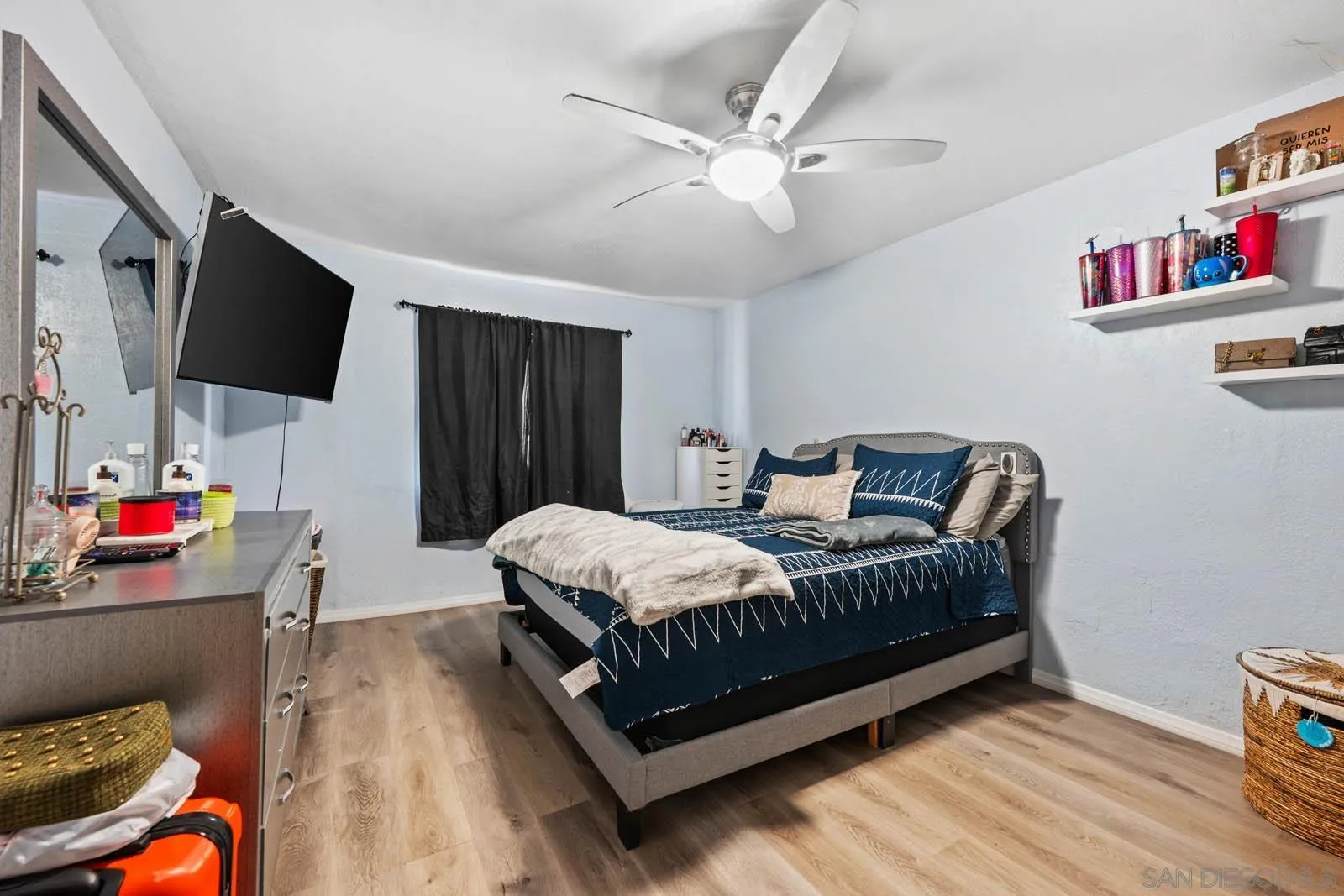 124 East View Street Fallbrook, CA 92028 - Photo 17 of 50 a living room with furniture and a flat screen tv