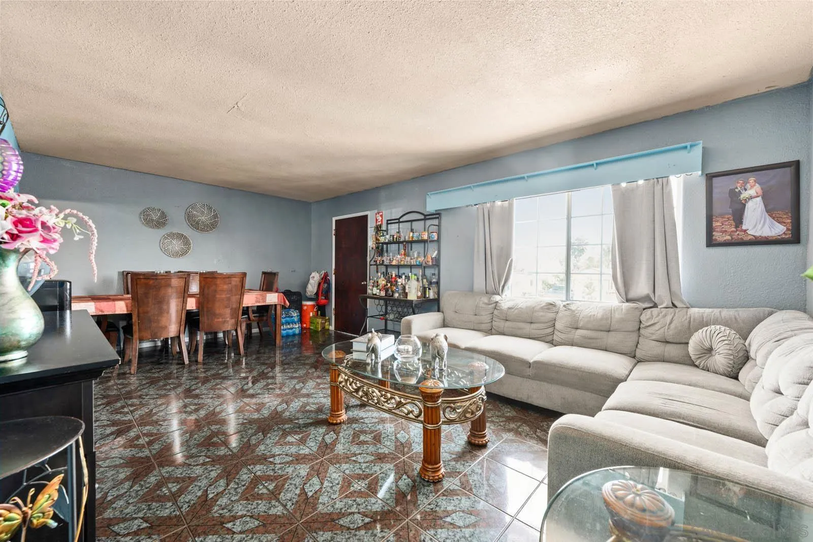 124 East View Street Fallbrook, CA 92028 - Photo 28 of 50 a living room with furniture and a large window
