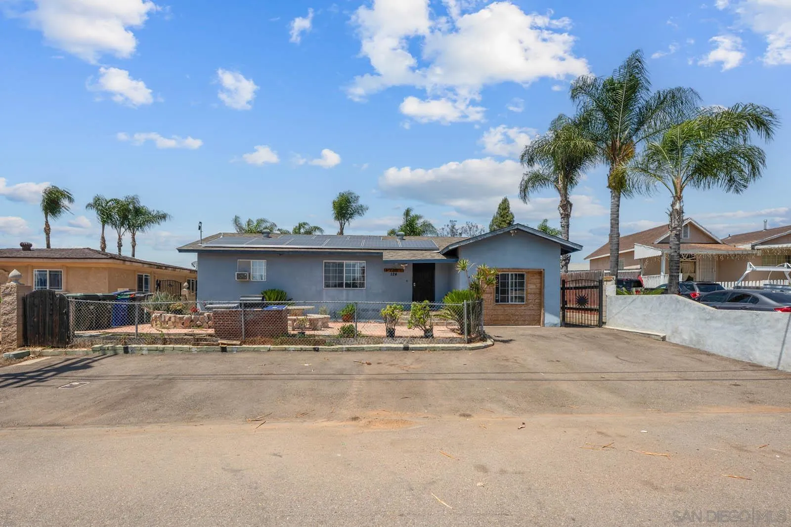 124 East View Street Fallbrook, CA 92028 - Photo 35 of 50 a front view of a house with large trees