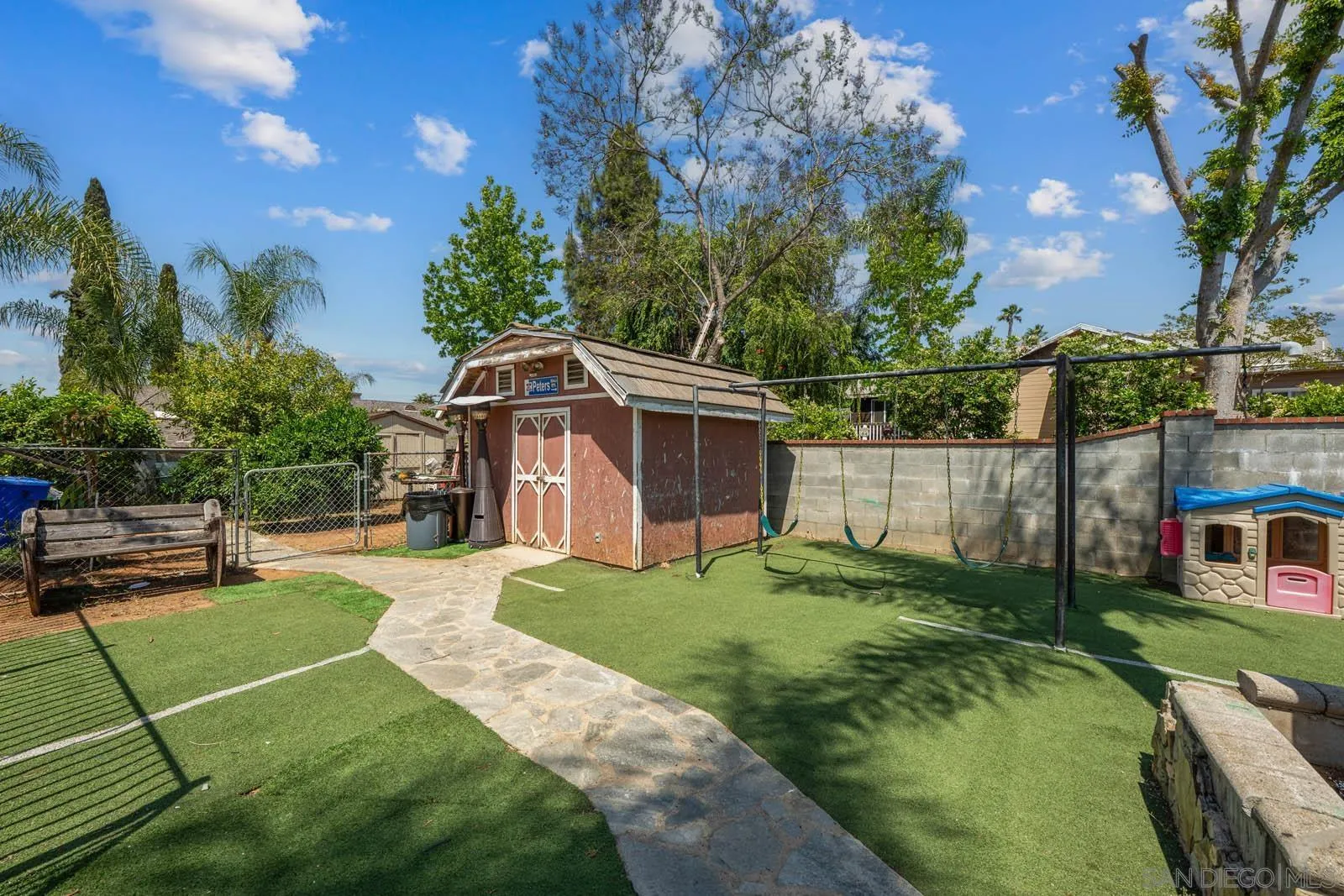 124 East View Street Fallbrook, CA 92028 - Photo 38 of 50 a front view of a house with a yard table and chairs