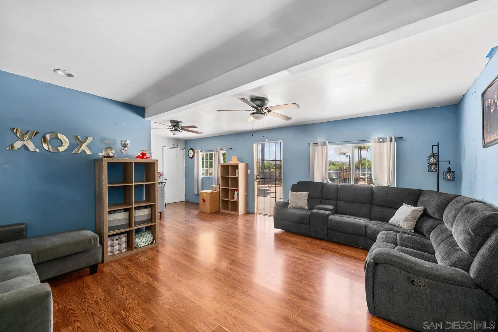 124 East View Street Fallbrook, CA 92028 - Photo 4 of 50 a living room with furniture and a wooden floor