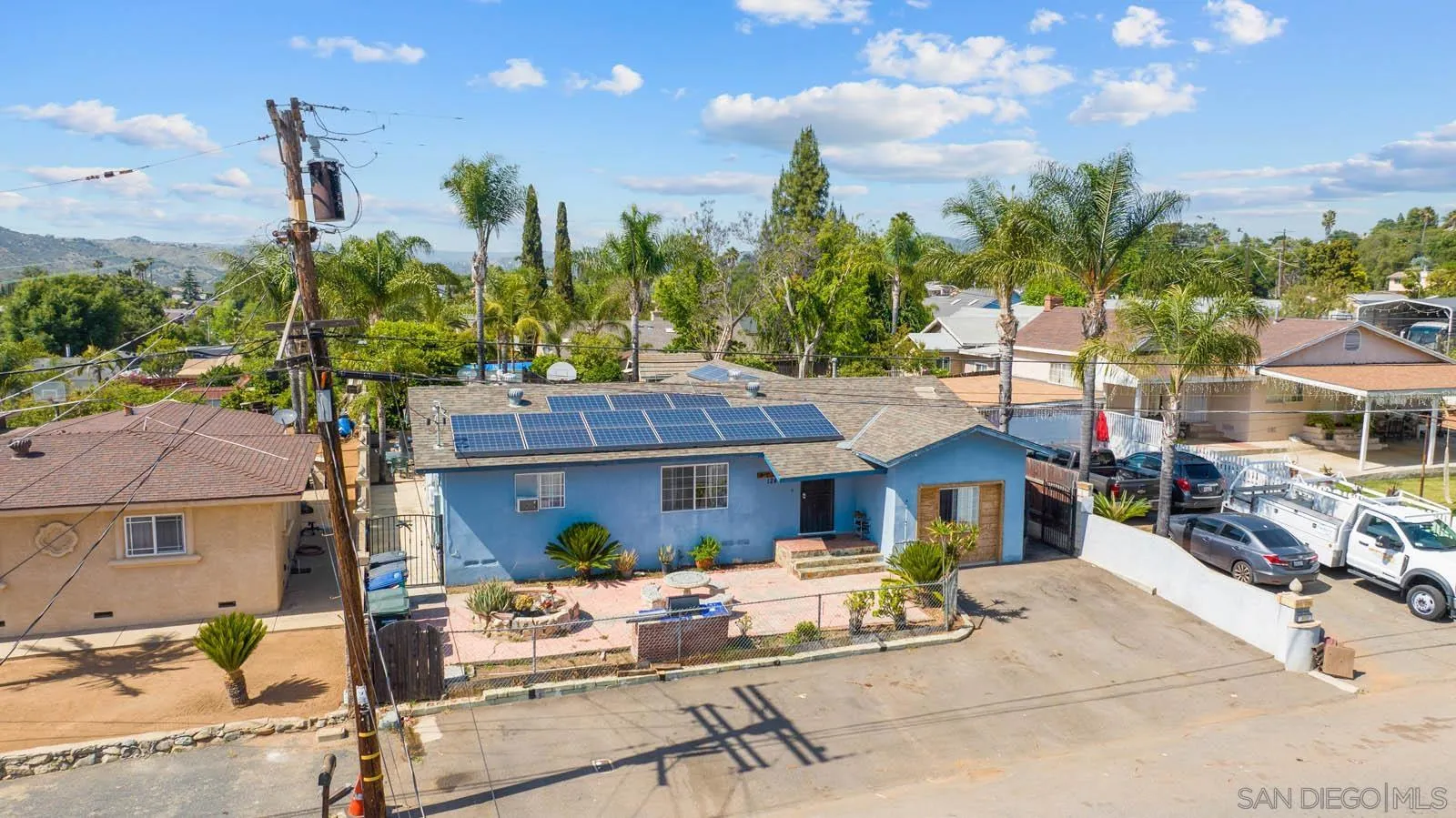124 East View Street Fallbrook, CA 92028 - Photo 44 of 50 a view of a patio with table and chairs and potted plants