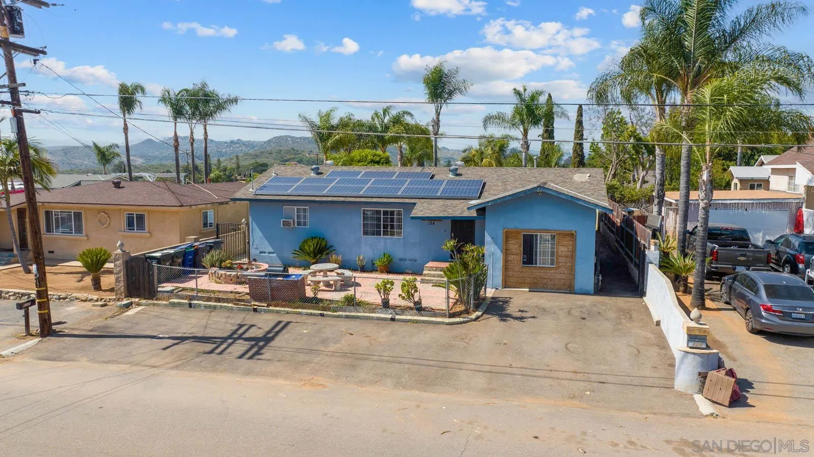 124 East View Street Fallbrook, CA 92028 - Photo 46 of 50 a view of a patio with a table and chairs under an umbrella