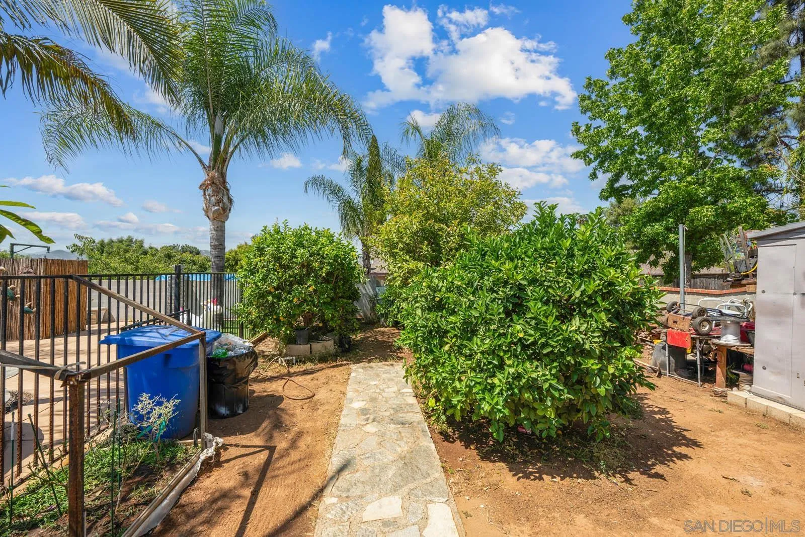 124 East View Street Fallbrook, CA 92028 - Photo 49 of 50 a view of a yard with plants and a table chair
