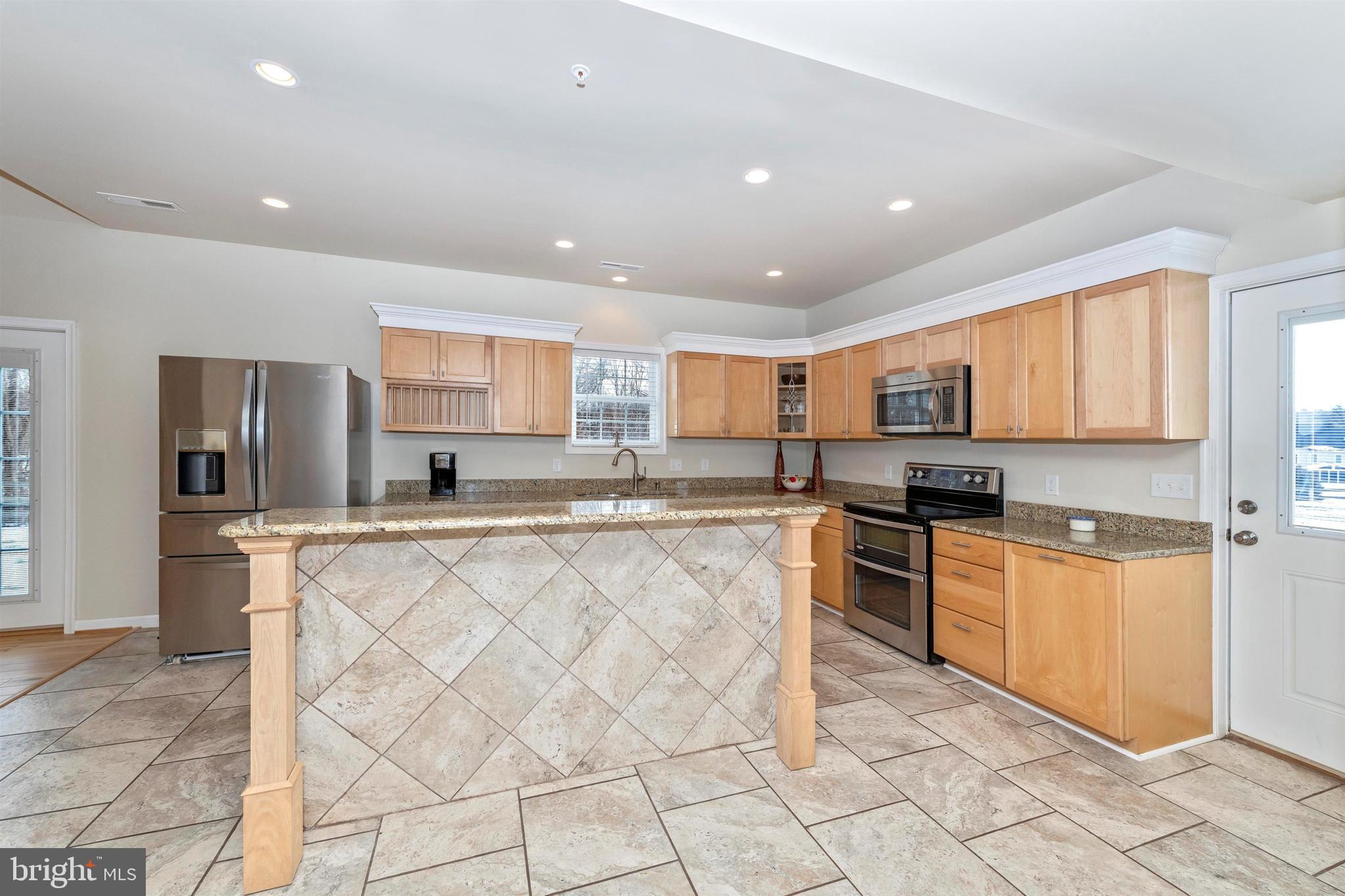 5655 Buffalo Road Mount Airy, MD 21771 - Photo 27 of 84 Kitchen has Large Ceramic Breakfast Bar