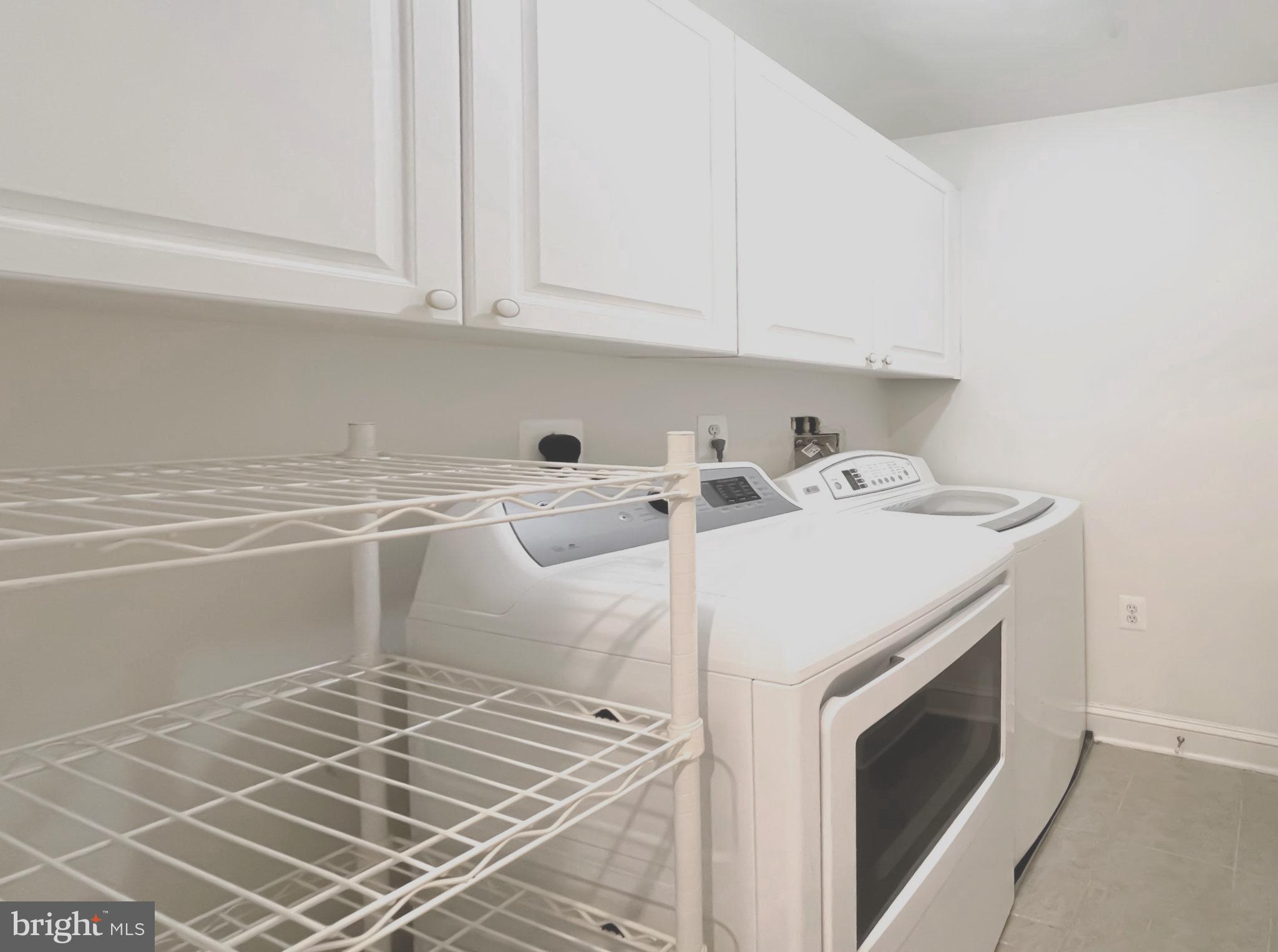 1555 North Colonial Terrace, Unit 600 Arlington, VA 22209 - Photo 14 of 29 a utility room with dryer and washer