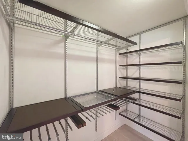 a white bath tub sitting in a bathroom