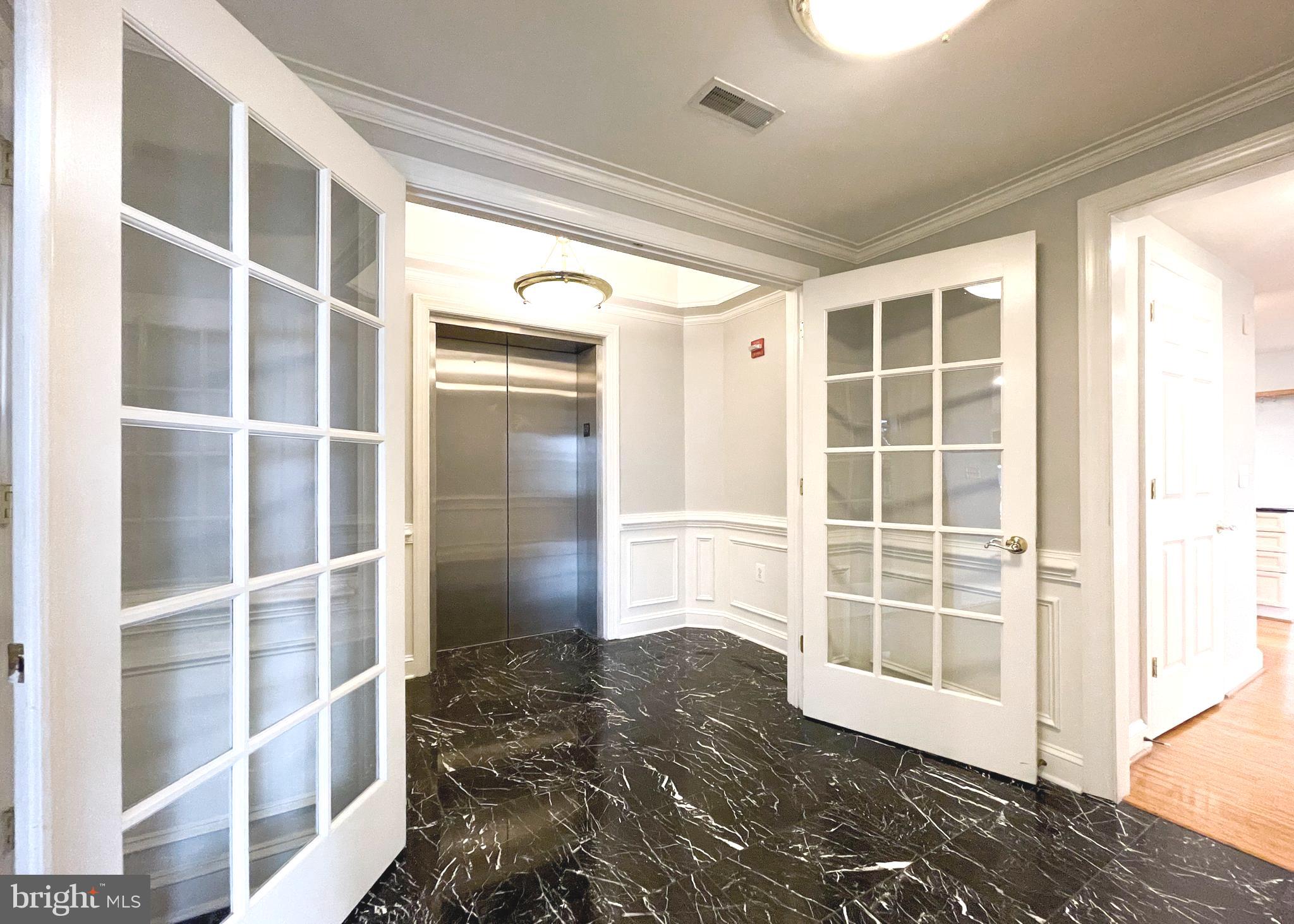1555 North Colonial Terrace, Unit 600 Arlington, VA 22209 - Photo 2 of 29 a view of empty room with a window