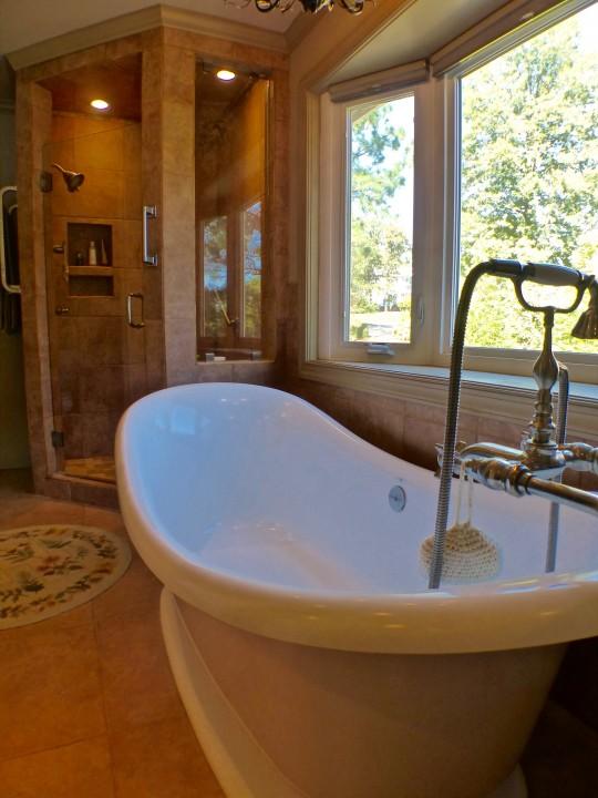 1100 Burning Tree Road Pinehurst, NC 28374 - Photo 11 of 28 This bath has a great soaking tub to relax after a long day.