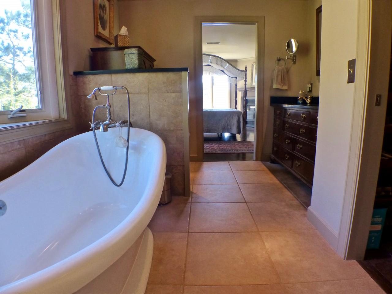 1100 Burning Tree Road Pinehurst, NC 28374 - Photo 13 of 28 Enjoy a hot bath in this deep soaking tub.