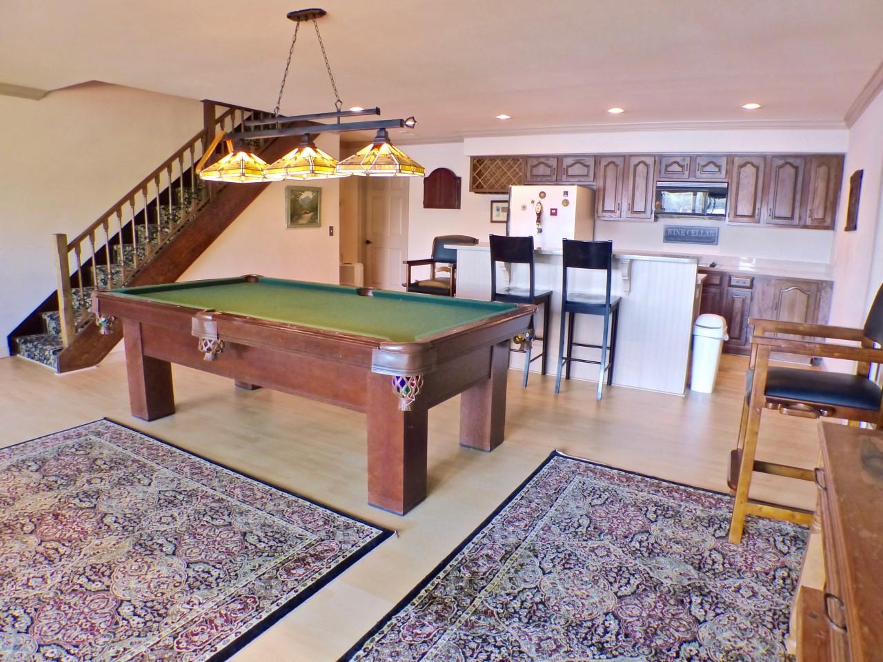 1100 Burning Tree Road Pinehurst, NC 28374 - Photo 16 of 28 Downstairs you will find a large bonus room with a kitchen area.