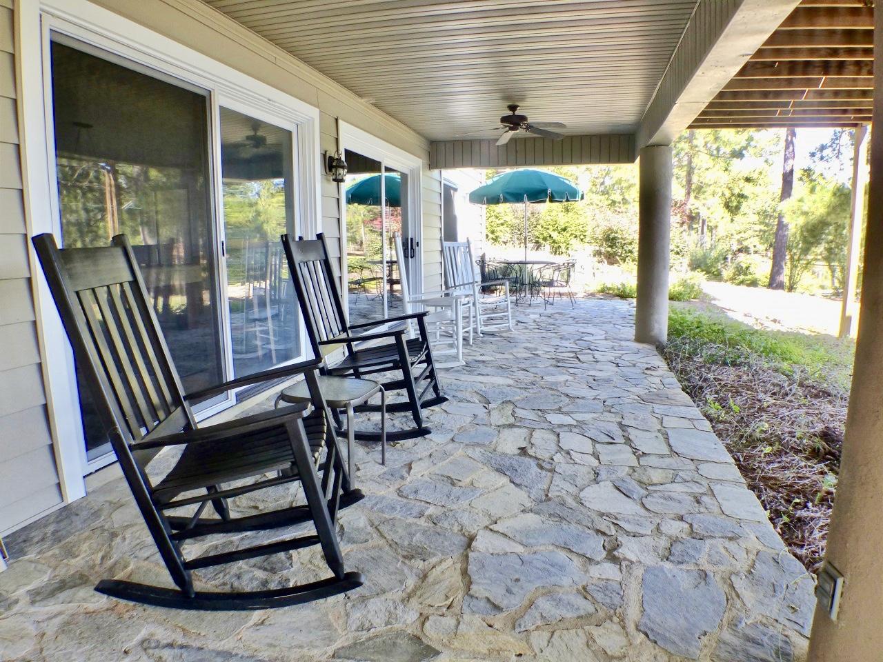 1100 Burning Tree Road Pinehurst, NC 28374 - Photo 24 of 28 This downstairs patio is large enough for many to sit and enjoy the views of Lake Pinehurst.