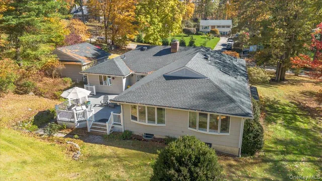 an outdoor space with furniture and umbrella