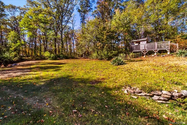 a kitchen with a sink a stove and cabinets