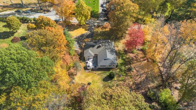 a backyard of a house with outdoor seating
