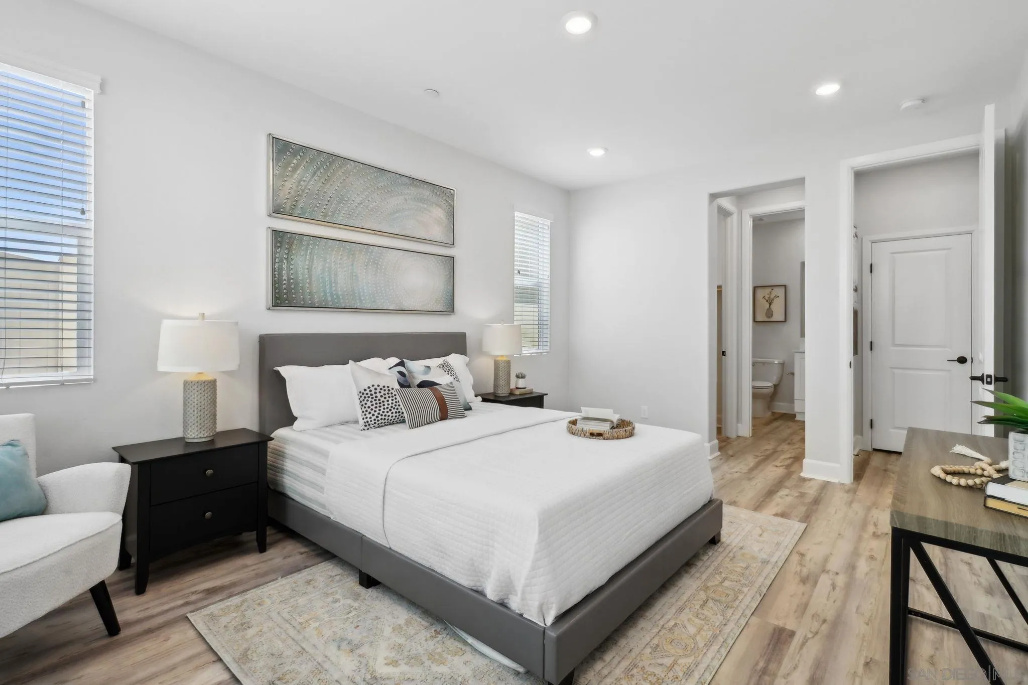 941 Lindbergh Drive San Marcos, CA 92069 - Photo 11 of 44 a bedroom with a bed and wooden floor