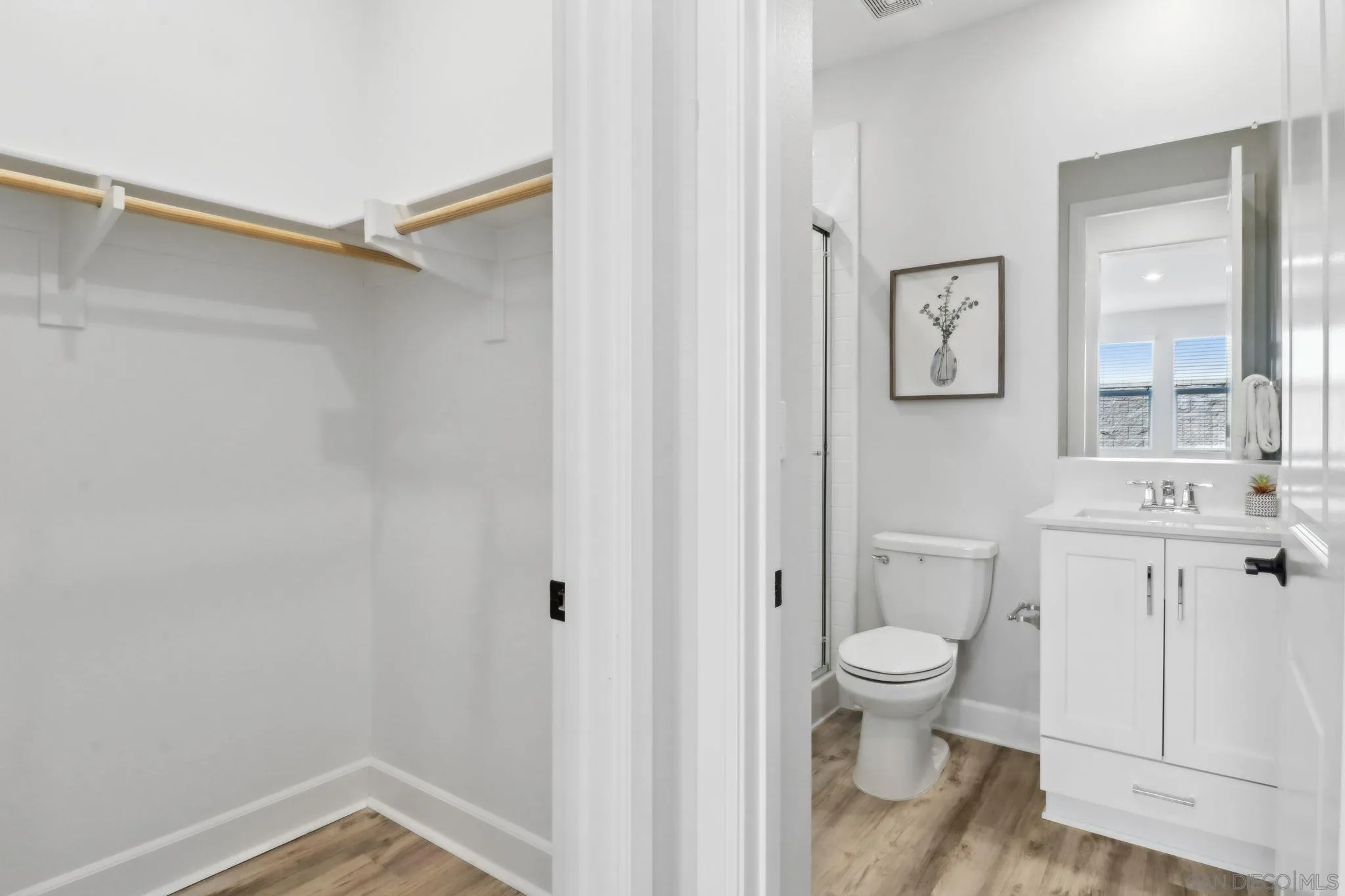 941 Lindbergh Drive San Marcos, CA 92069 - Photo 12 of 44 a bathroom with a toilet sink and a shower