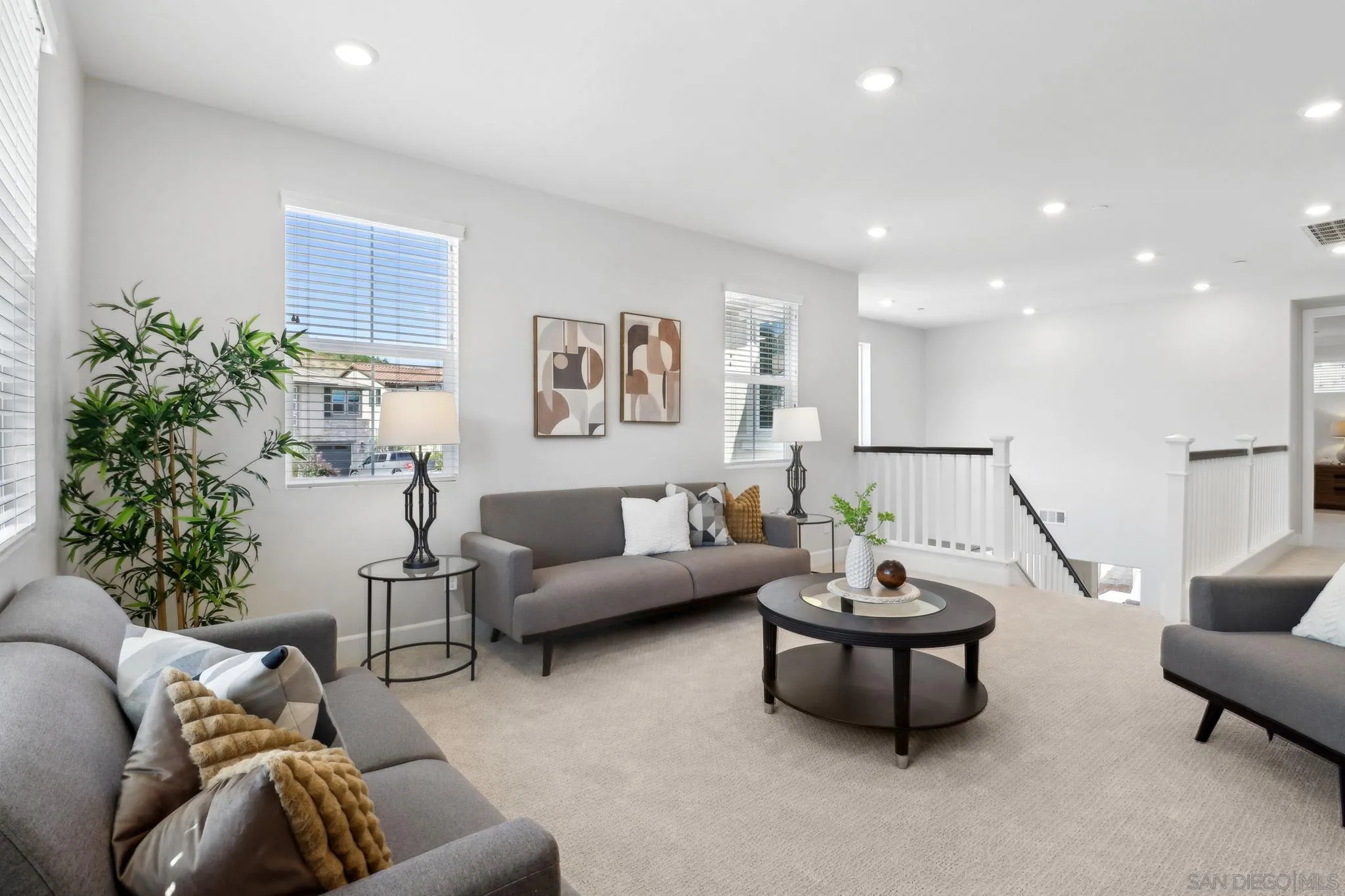 941 Lindbergh Drive San Marcos, CA 92069 - Photo 16 of 44 a living room with furniture and a potted plant