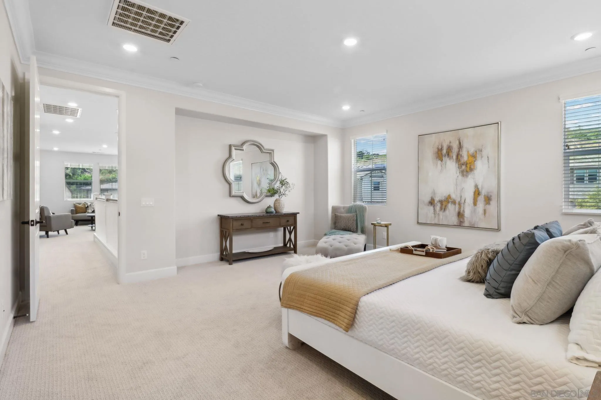 941 Lindbergh Drive San Marcos, CA 92069 - Photo 21 of 44 a bedroom with a bed and glass windows