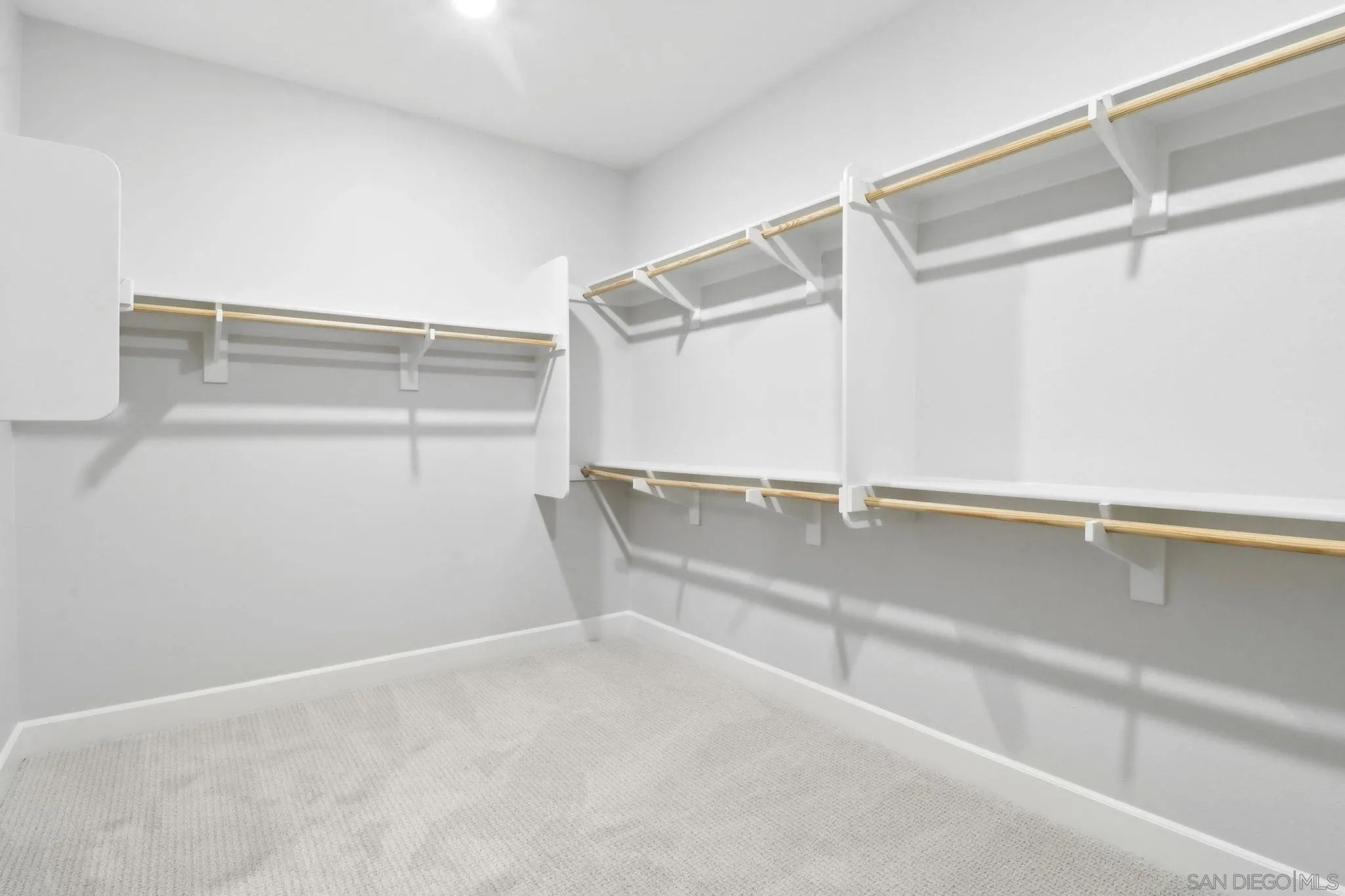 941 Lindbergh Drive San Marcos, CA 92069 - Photo 25 of 44 a view of an empty walk in closet