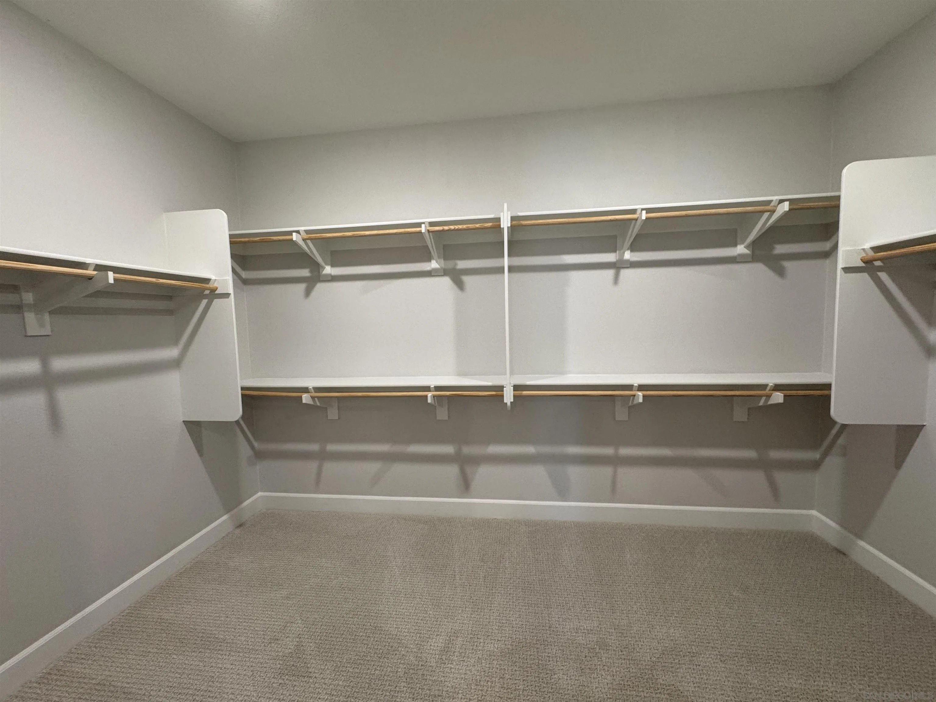 941 Lindbergh Drive San Marcos, CA 92069 - Photo 26 of 44 a view of an empty walk in closet