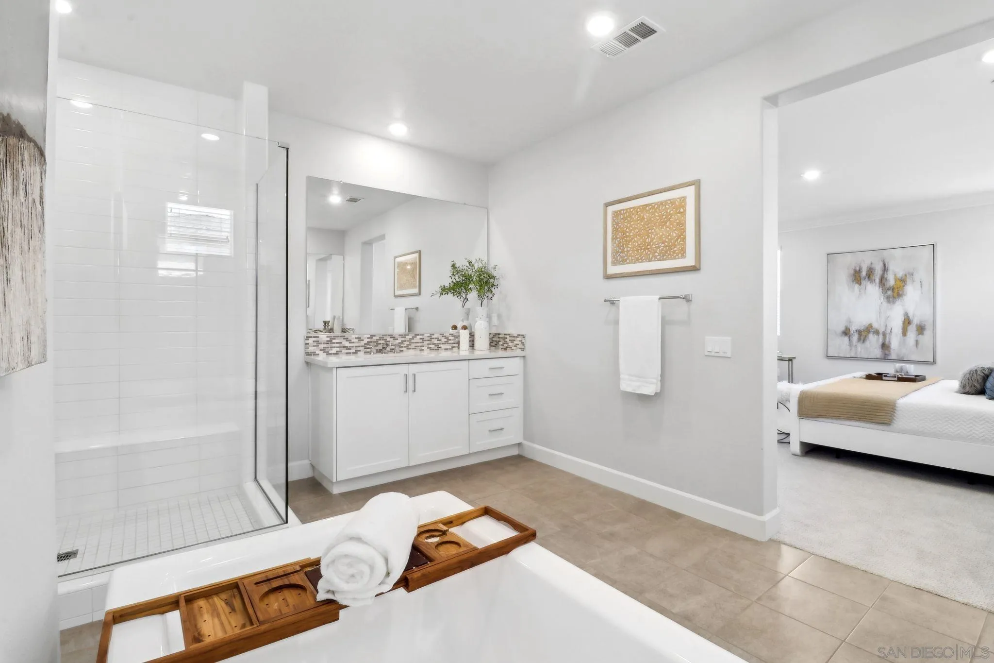 941 Lindbergh Drive San Marcos, CA 92069 - Photo 29 of 44 a bedroom with a bed a couch and dresser